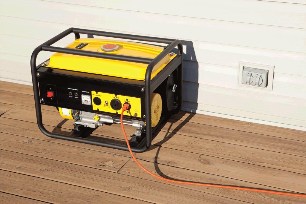 Extension-cord-plugged-into-a-gasoline-powered-4000-watt-portable-electric-generator.png